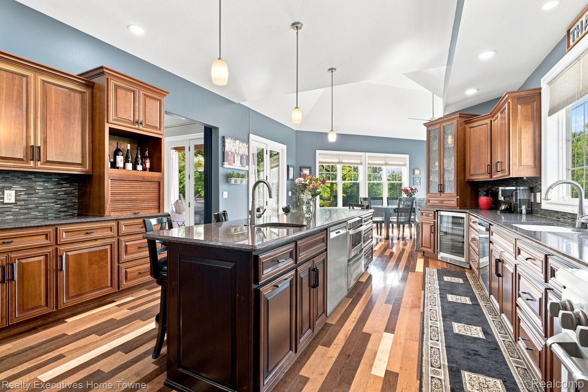2829 Riverside Drive Port Huron, MI 48060 - Photo 5 of 99 Kitchen featuring wood-finish flooring, recessed lighting, and a vaulted ceiling