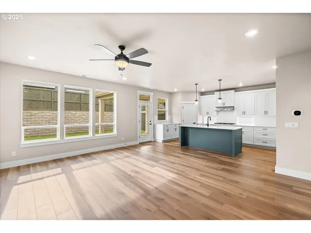 a view of kitchen with wooden floor and window