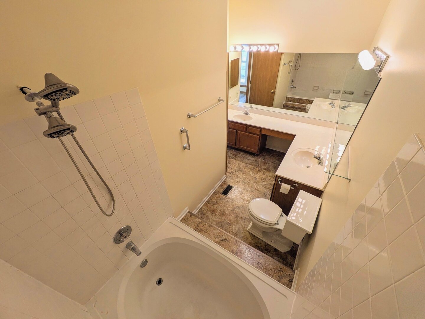 28 North Oltendorf Road, Unit 28 Streamwood, IL 60107 - Photo 13 of 13 a bathroom with a sink and mirror