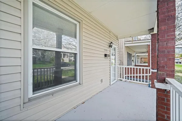 a view of a house with a porch