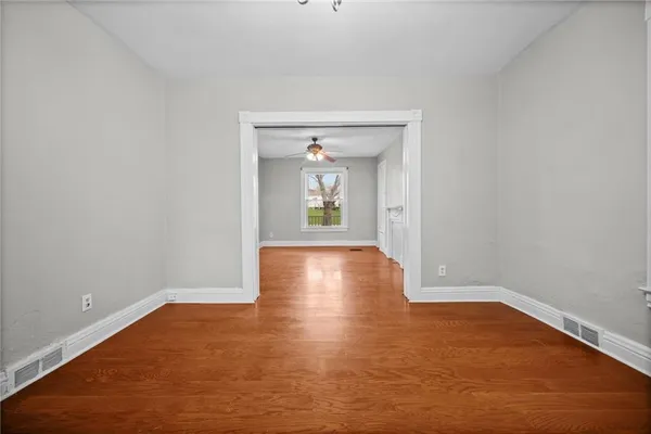 a view of livingroom with wooden floor