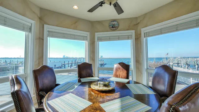 a kitchen with sink stove and a refrigerator