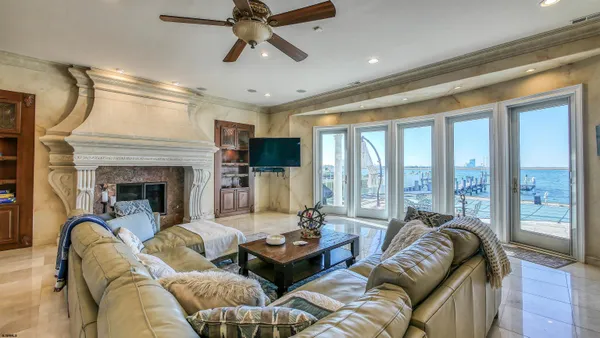 a work room with furniture and a window