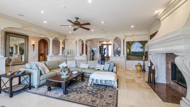 a kitchen with stainless steel appliances granite countertop a stove and a wooden floors