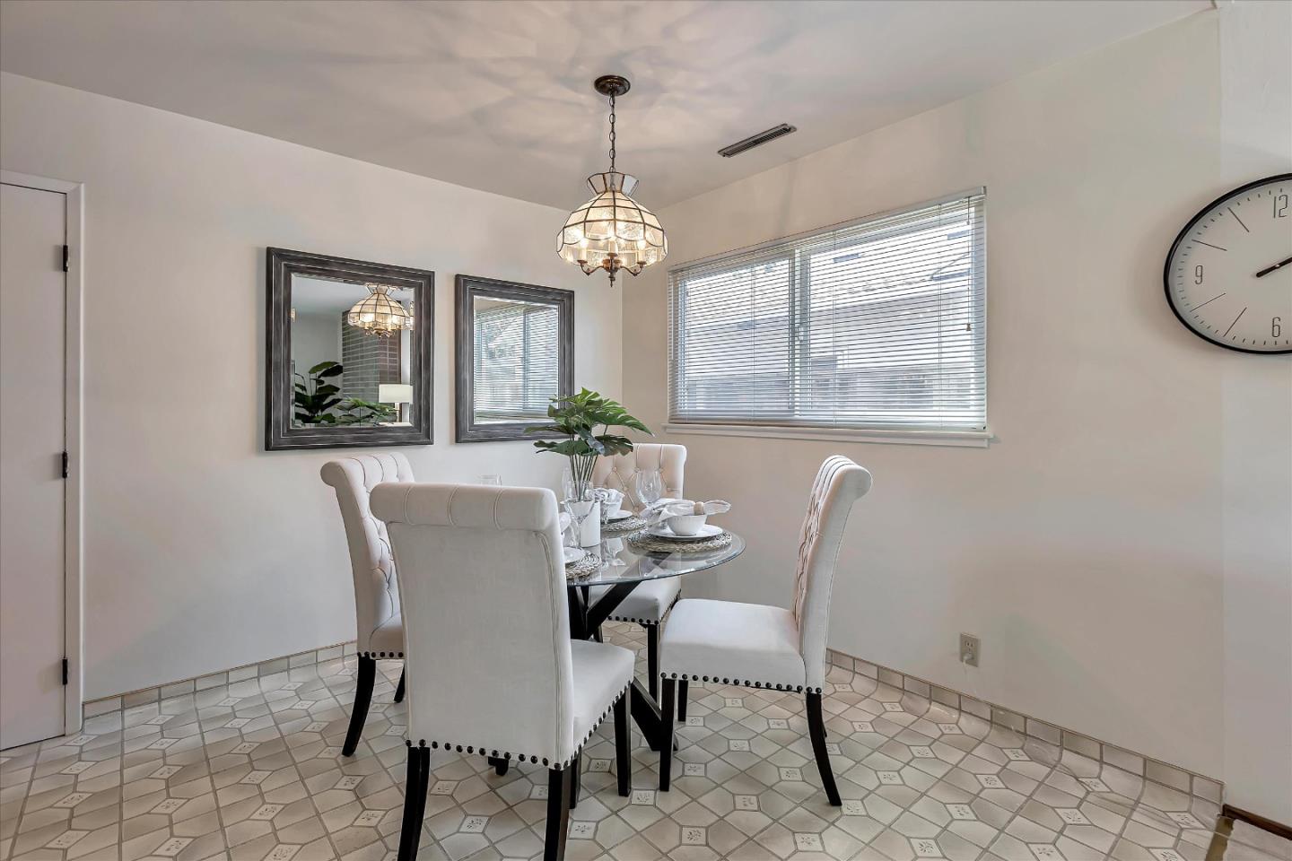 126 Brian Lane Santa Clara, CA 95051 - Photo 11 of 21 a dining room with furniture a chandelier and window