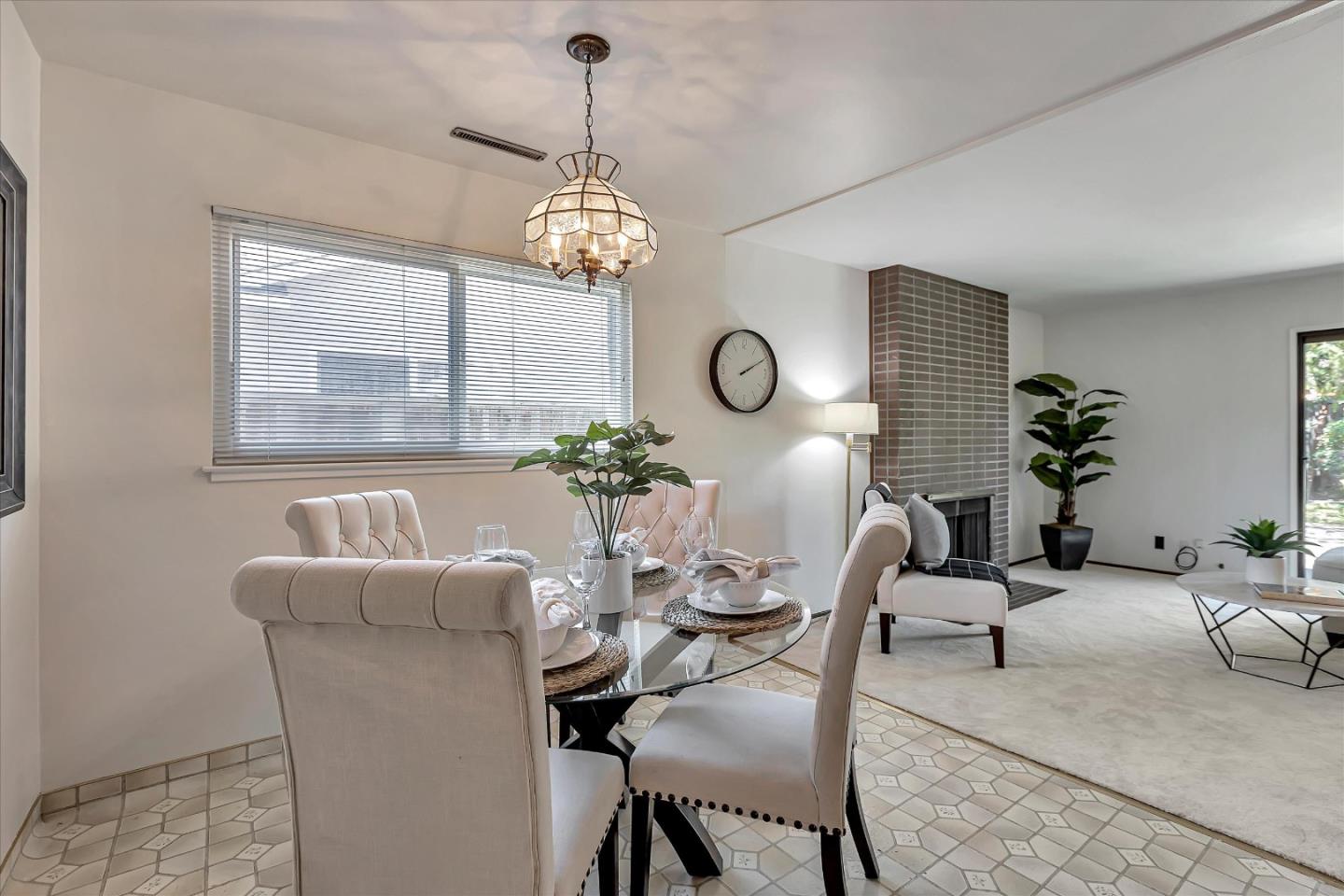 126 Brian Lane Santa Clara, CA 95051 - Photo 12 of 21 a living room with furniture a chandelier and a window