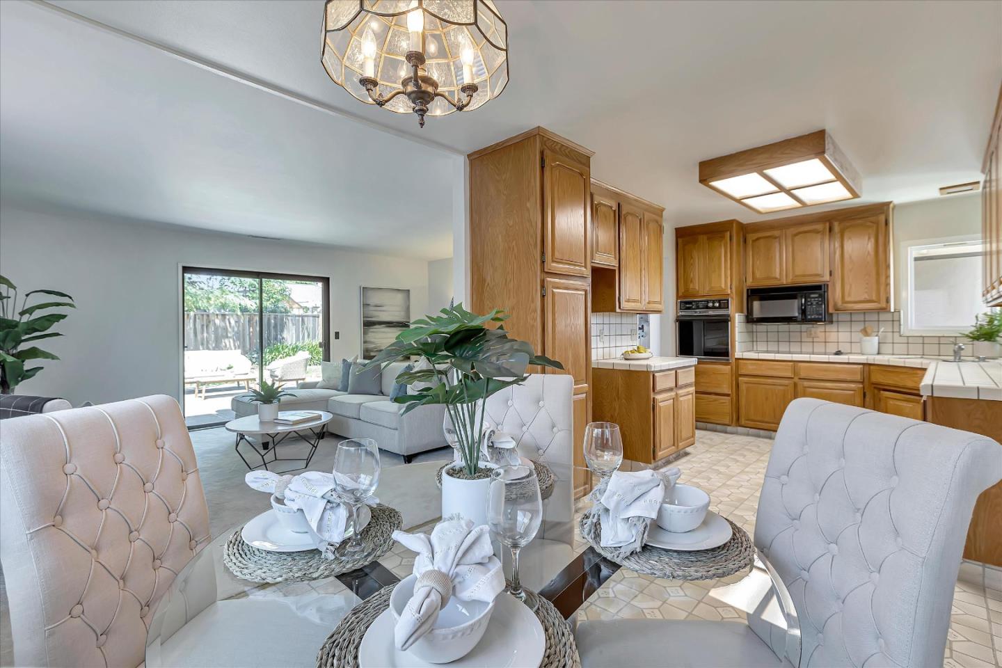 126 Brian Lane Santa Clara, CA 95051 - Photo 13 of 21 a kitchen with stainless steel appliances kitchen island granite countertop furniture and a view of kitchen