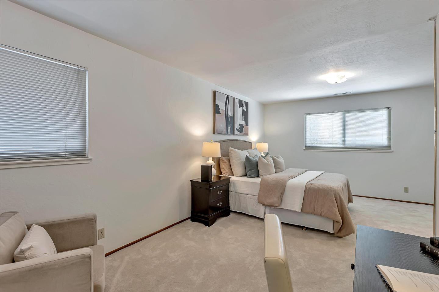 126 Brian Lane Santa Clara, CA 95051 - Photo 16 of 21 a bedroom with a bed and a couch