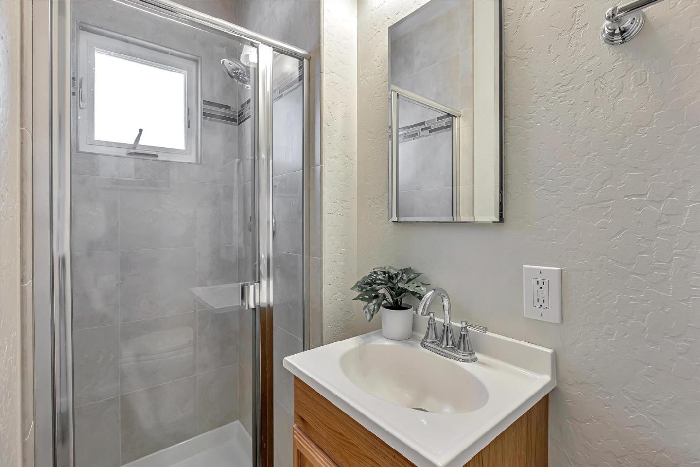 126 Brian Lane Santa Clara, CA 95051 - Photo 19 of 21 a bathroom with a sink and a mirror