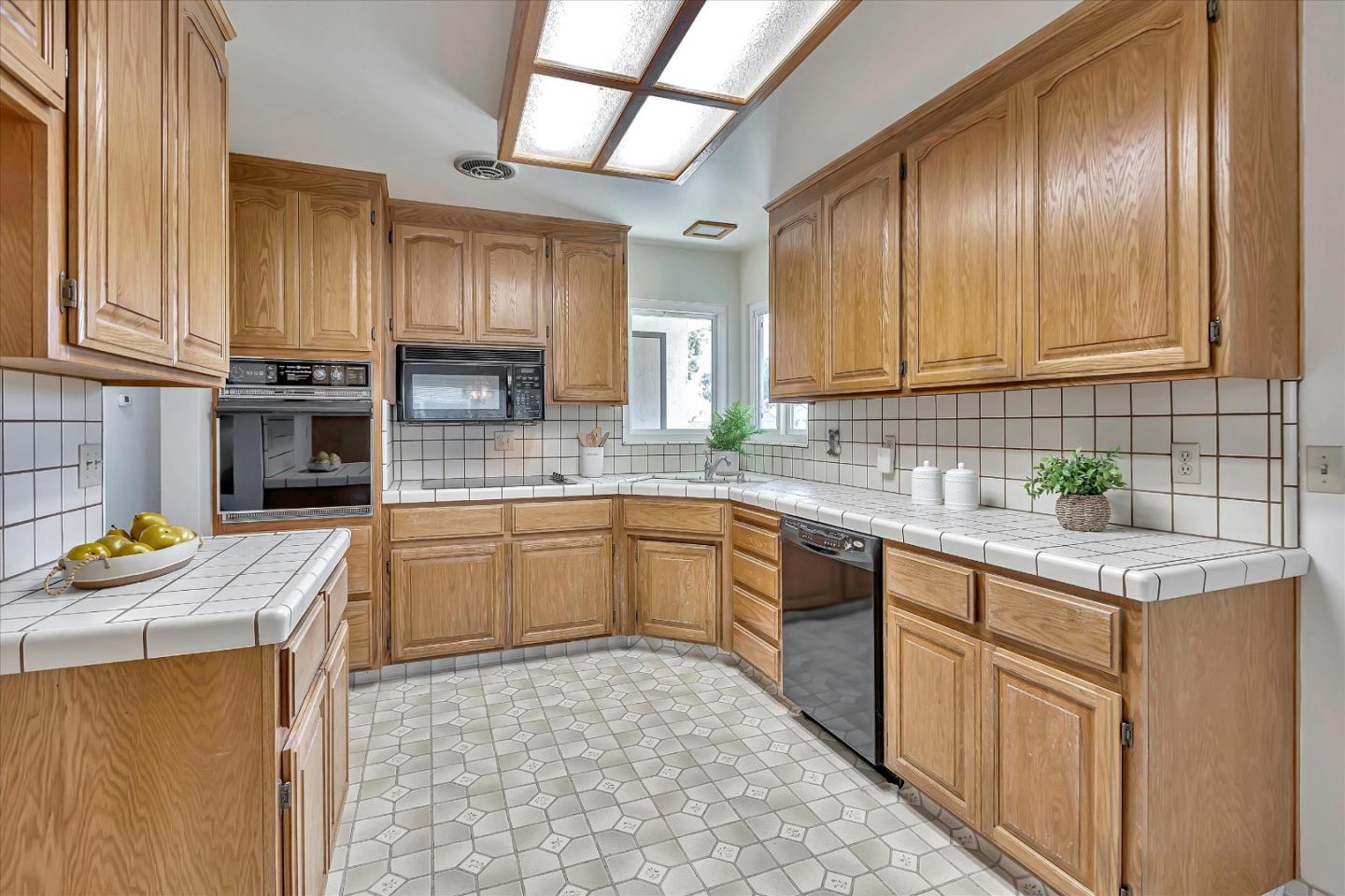 126 Brian Lane Santa Clara, CA 95051 - Photo 6 of 21 a kitchen with granite countertop cabinets stainless steel appliances a sink and a counter top space