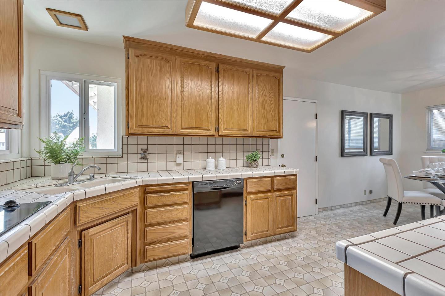 126 Brian Lane Santa Clara, CA 95051 - Photo 8 of 21 a kitchen with cabinets appliances and a sink