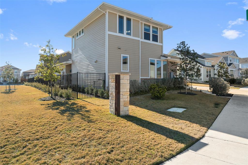 8419 Laughlin Lane Austin, TX 78744 - Photo 33 of 40 View of home's exterior with a residential view