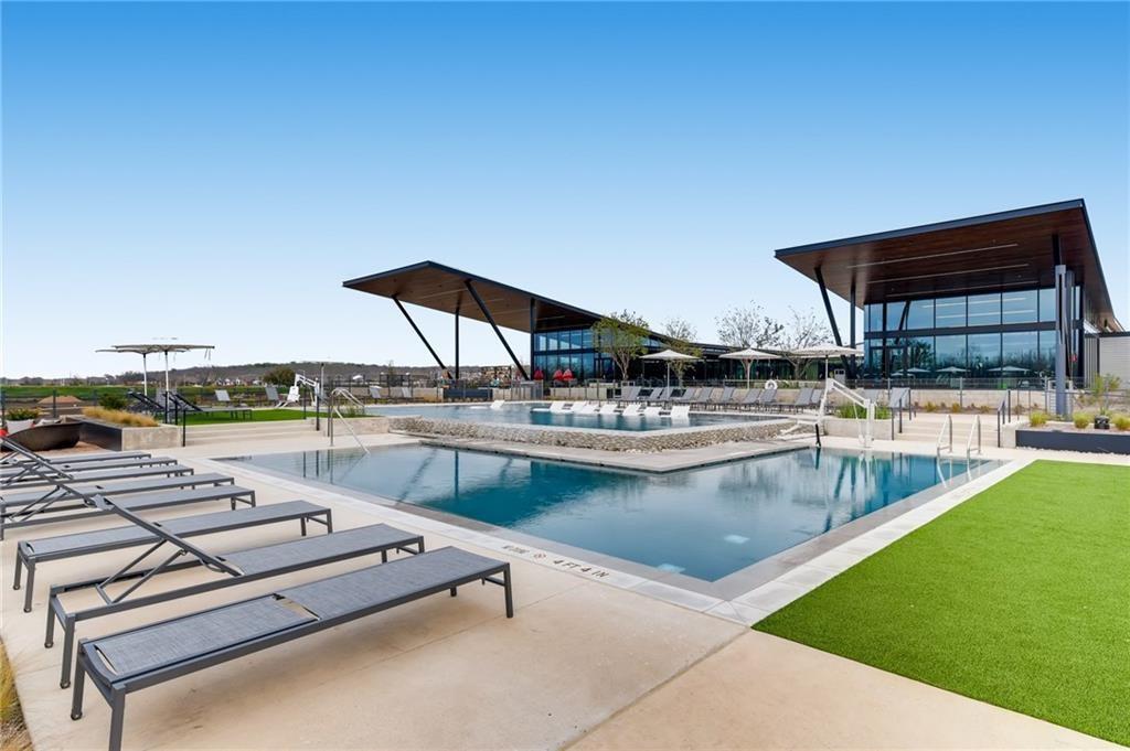 8419 Laughlin Lane Austin, TX 78744 - Photo 35 of 40 Community pool featuring a patio area