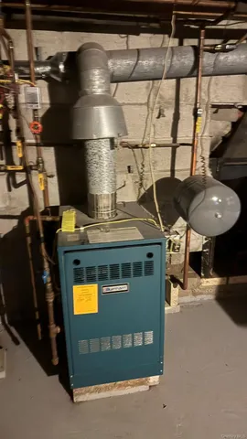 a stove top oven sitting inside of a kitchen