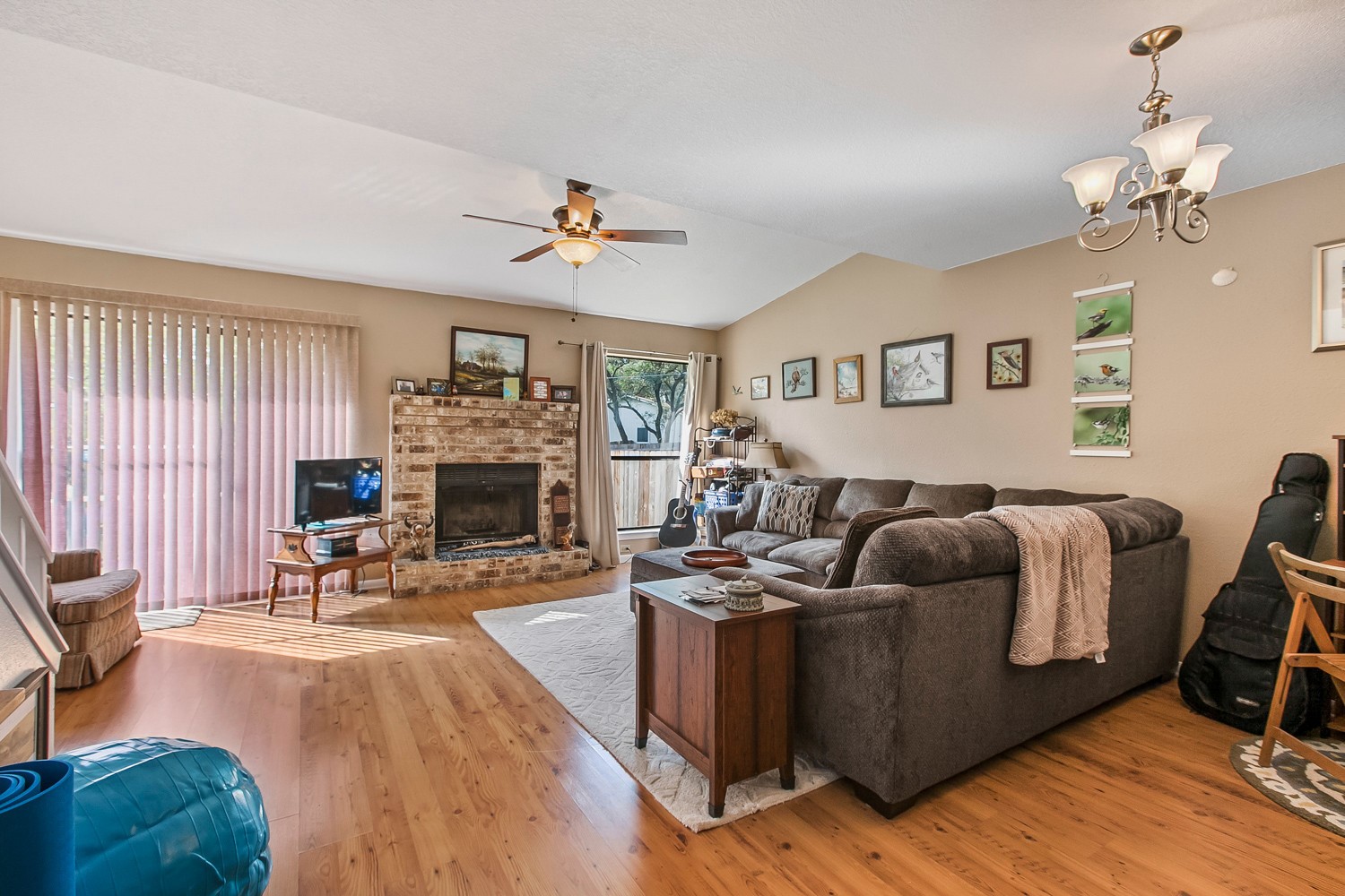 6029 Old Fredericksburg Road, Unit A Austin, TX 78749 - Photo 14 of 20 a living room with furniture and a fireplace