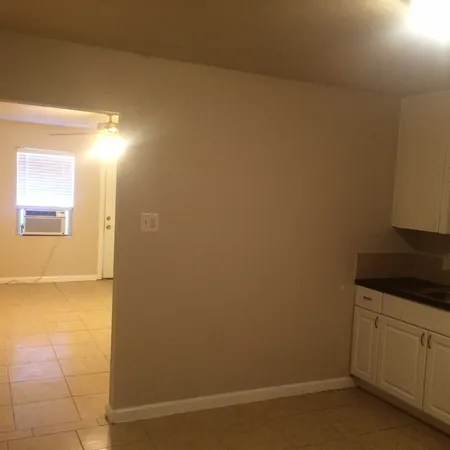 a bathroom with a sink and vanity