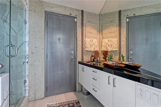 a view of path along with retail shop and buildings