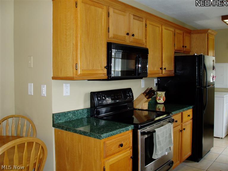 Appliances remain in the home and include stove, fridge, microwave, washer and dryer.