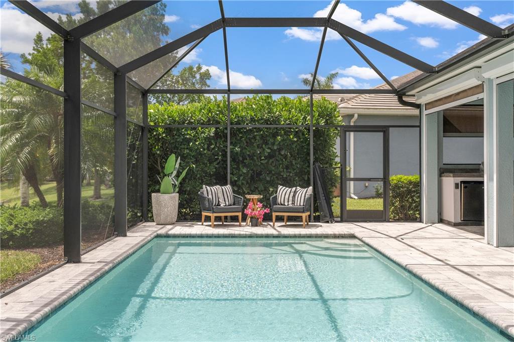 14837 Windward Lane Naples, FL 34114 - Photo 12 of 39 a view of outdoor space with seating area