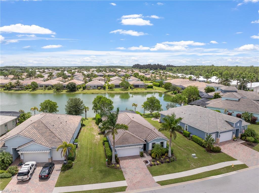 14837 Windward Lane Naples, FL 34114 - Photo 37 of 39 an aerial view of residential houses with outdoor space