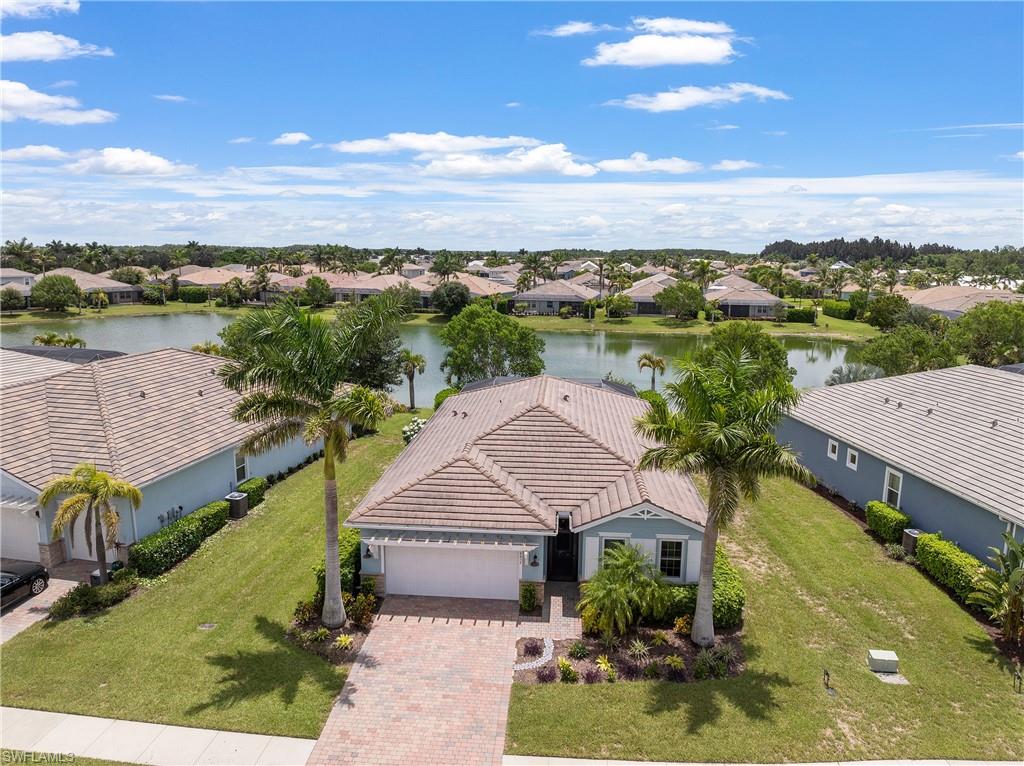 14837 Windward Lane Naples, FL 34114 - Photo 38 of 39 an aerial view of a house with a garden