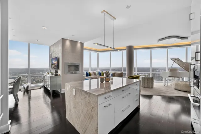 a kitchen with living room and living room view