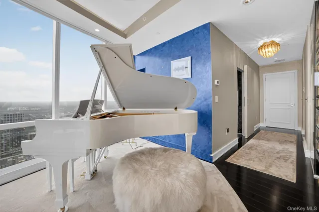 a view of a living room and bathroom