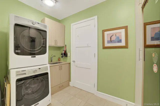 a hallway with washer and dryer