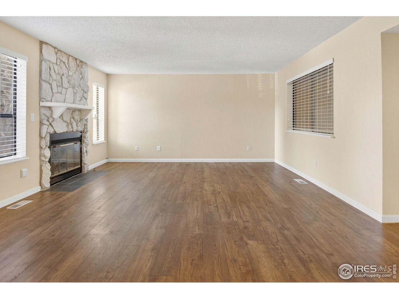 9407 West 89th Circle Broomfield, CO 80021 - Photo 11 of 32 a view of livingroom with hardwood