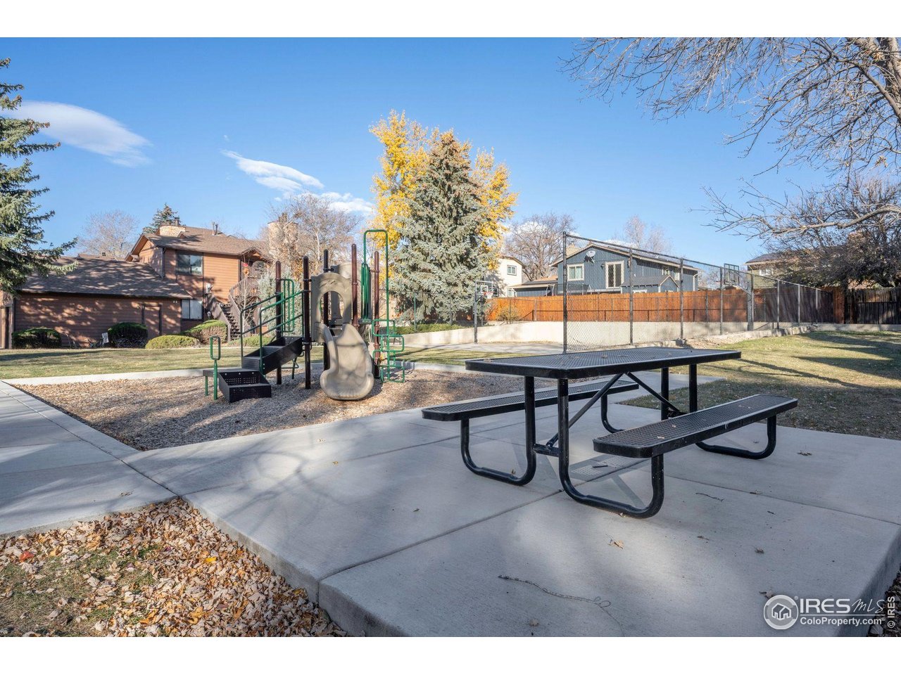 9407 West 89th Circle Broomfield, CO 80021 - Photo 27 of 32 a sitting area with glass top table and chairs