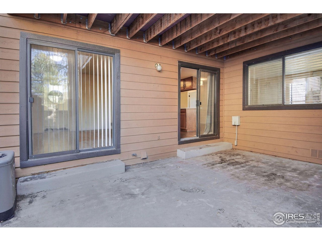 9407 West 89th Circle Broomfield, CO 80021 - Photo 7 of 32 a view of an empty room with a window