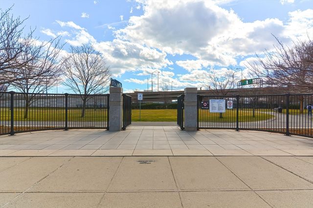 a view of a building with a backyard