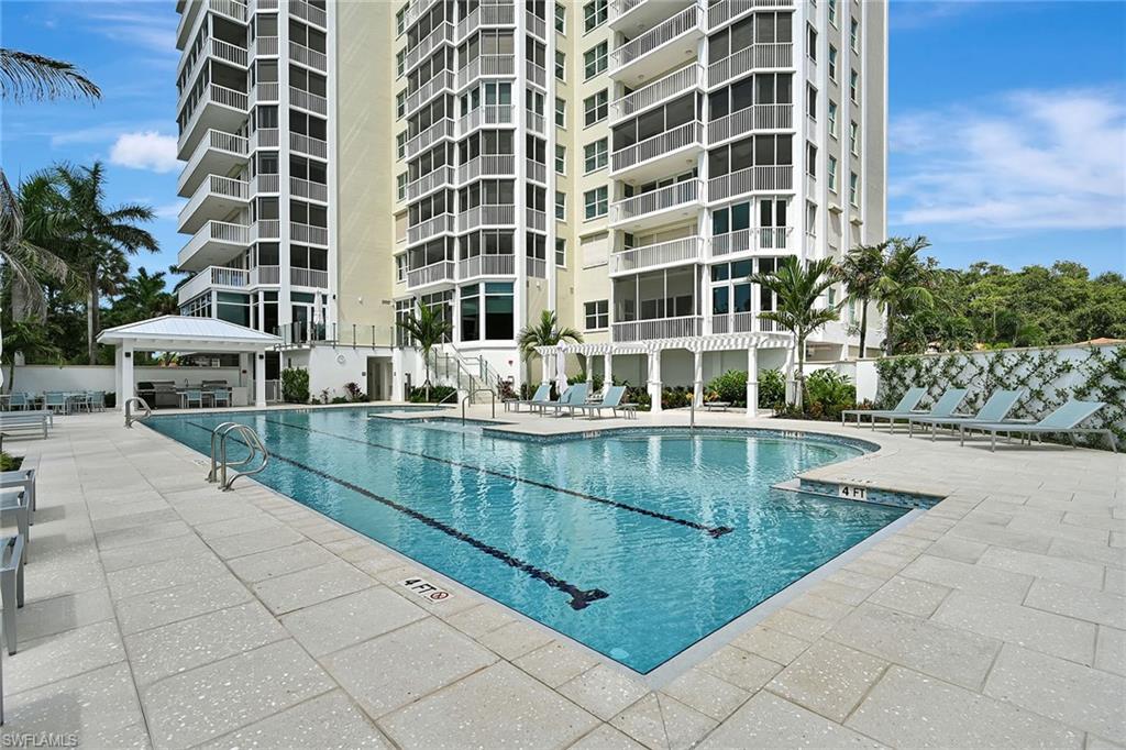 6573 Marissa Loop, Unit 703 Naples, FL 34108 - Photo 26 of 38 Community Pool with 2 Lap Lanes