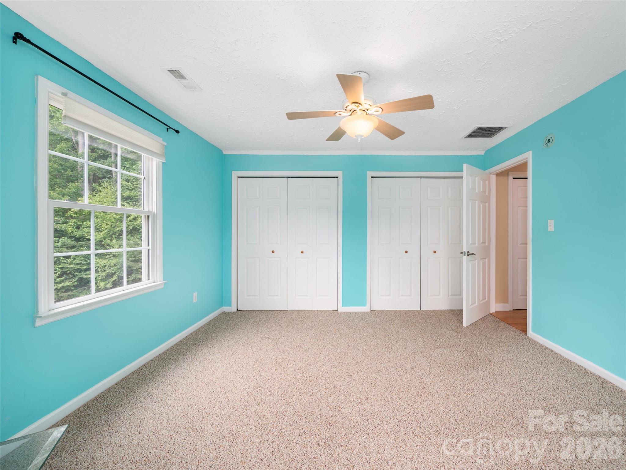 2216 Beans Creek Road Bakersville, NC 28705 - Photo 24 of 39 a view of an empty room with a window