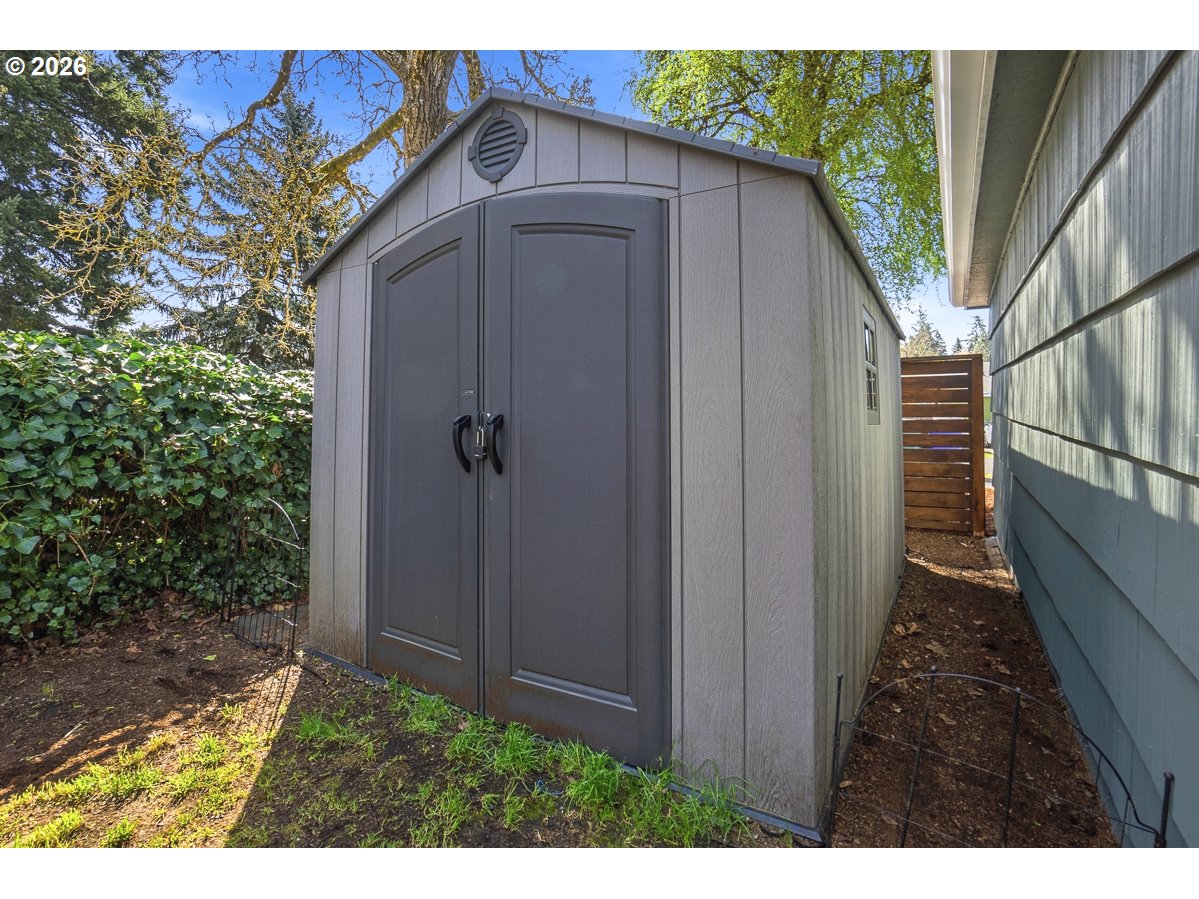 622 Southeast 111th Avenue Portland, OR 97216 - Photo 26 of 34 a view of a house with a small yard