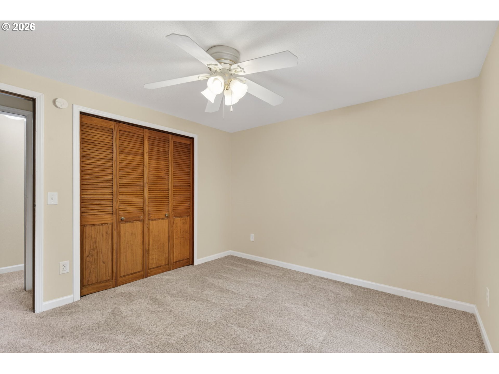 33501 Blaha Road Warren, OR 97053 - Photo 24 of 48 a view of an empty room with a ceiling fan