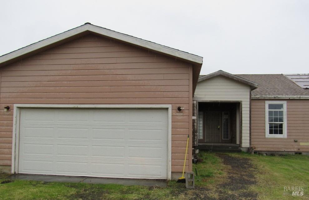 7351 3rd Gate Road Willits, CA 95490 - Photo 1 of 1 a front view of a house with a yard
