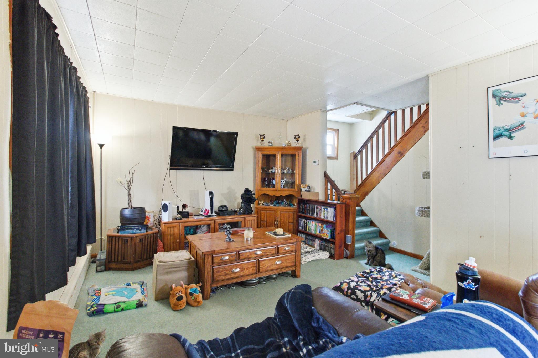 624 Decatur Street Philipsburg, PA 16866 - Photo 14 of 19 a living room with furniture and a flat screen tv