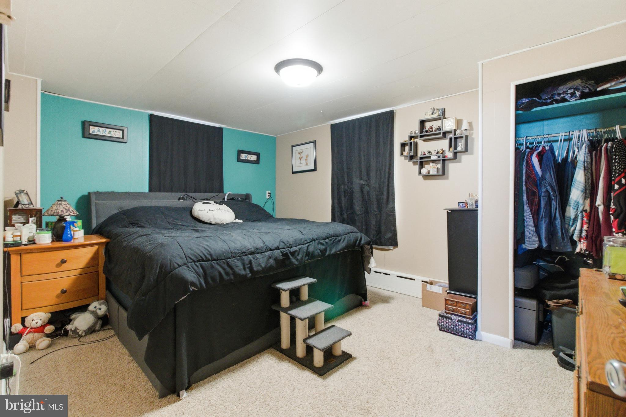 624 Decatur Street Philipsburg, PA 16866 - Photo 17 of 19 a bedroom with a bed and a desk