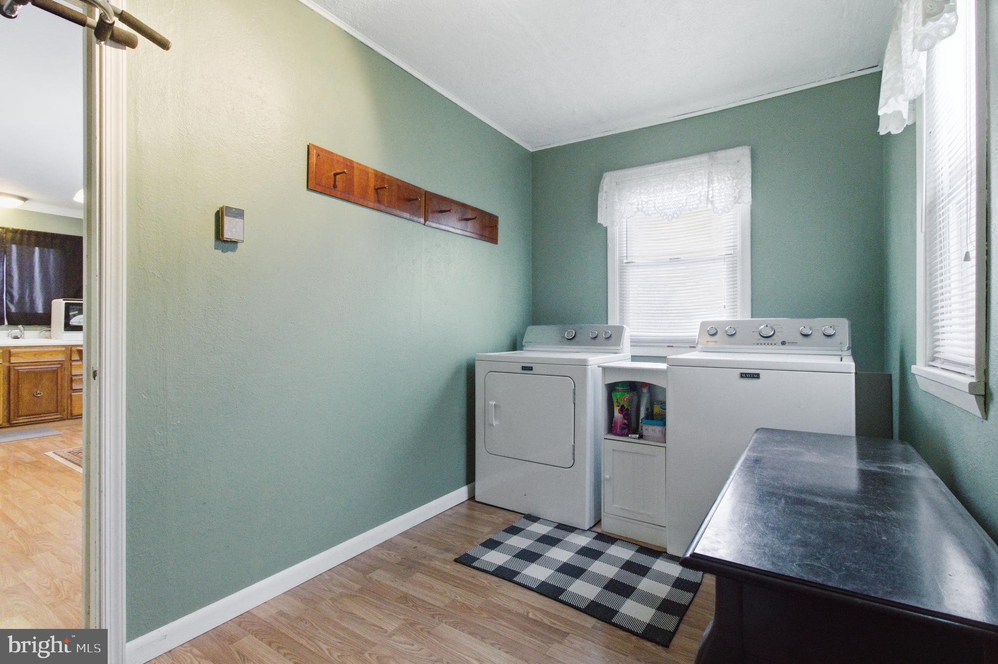 624 Decatur Street Philipsburg, PA 16866 - Photo 6 of 19 a storage room with washer and dryer