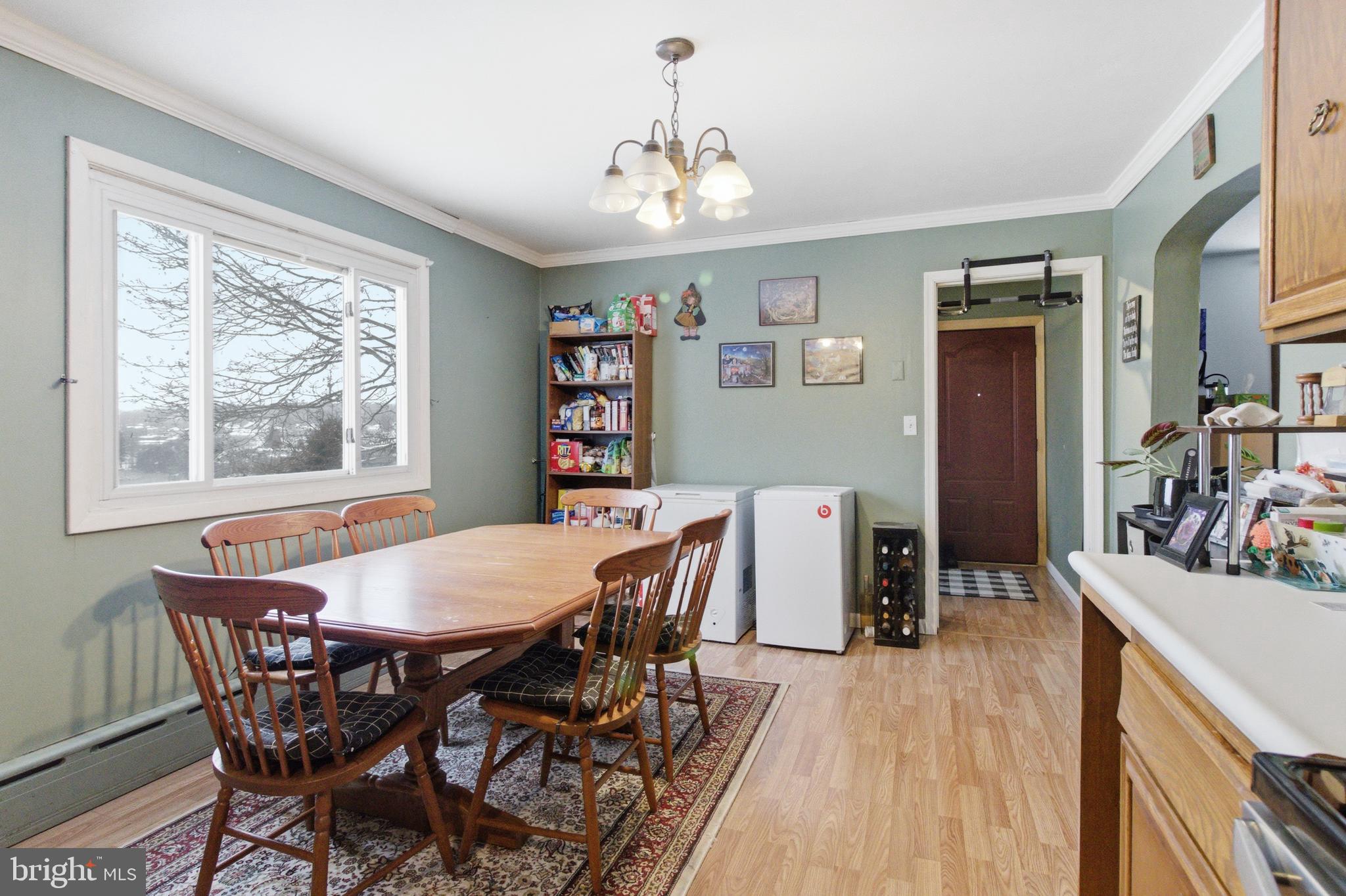 624 Decatur Street Philipsburg, PA 16866 - Photo 10 of 19 a view of a dining room with furniture window and wooden floor