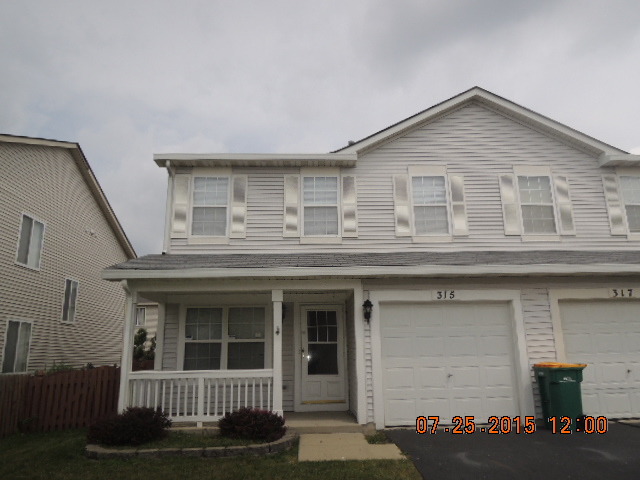 315 Reston Circle Romeoville, IL 60446 - Photo 1 of 14 a view of a house with wooden floor and fence