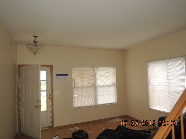 315 Reston Circle Romeoville, IL 60446 - Photo 2 of 14 a view of a livingroom with a window