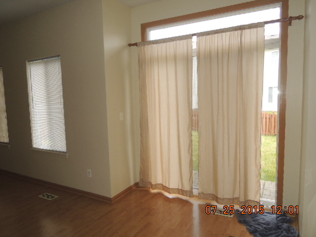 315 Reston Circle Romeoville, IL 60446 - Photo 5 of 14 a view of a bedroom with windows