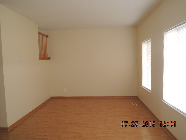 315 Reston Circle Romeoville, IL 60446 - Photo 6 of 14 an empty room with a window