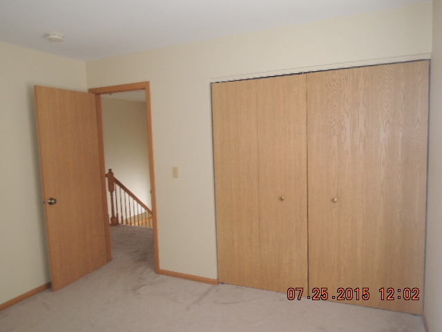 315 Reston Circle Romeoville, IL 60446 - Photo 8 of 14 a view of a room with an entryway
