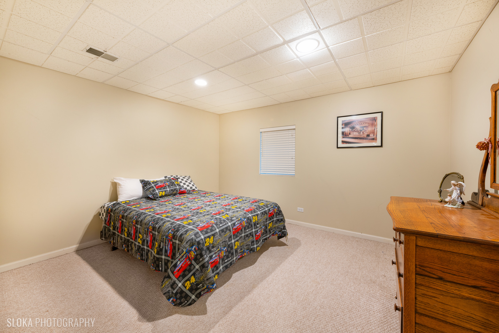 1170 Ridgewood Circle Lake In The Hills, IL 60156 - Photo 28 of 33 a bedroom with a bed and a table in it