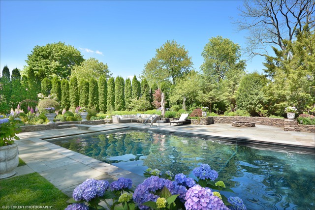 771 Washington Road Lake Forest, IL 60045 - Photo 3 of 25 a swimming pool with outdoor seating and garden