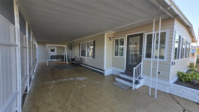 a view of a livingroom with couch and table