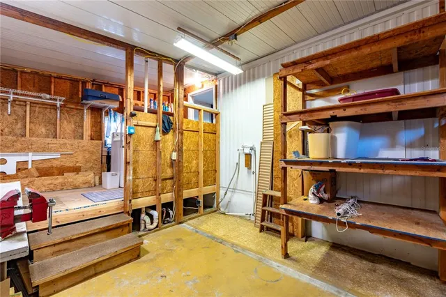 a view of a lake with houses in the back